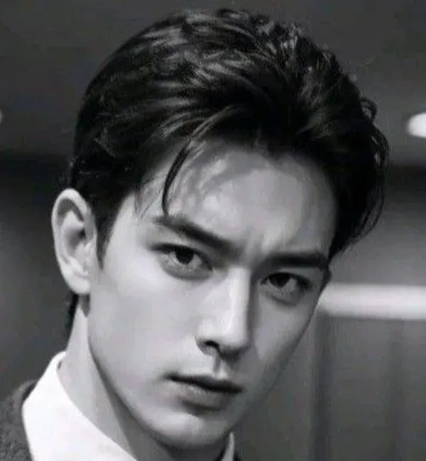 Sleek Middle Part with Short Sides Sleek Middle Part with Short Sides